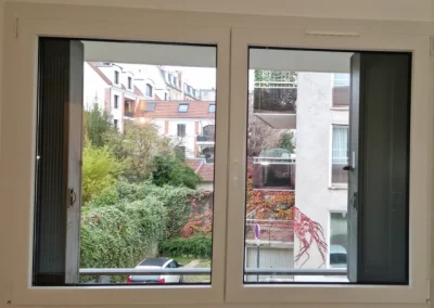 Pose de fenêtres et portes fenêtres, rue Raymond Marcheron à Vanves